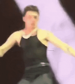 Peso Pluma Weirdly Shaking Head GIF