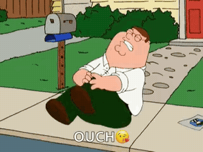 Peter Griffin From Family Guy Is Laying On The Sidewalk With The Word Ouch Above Him GIF