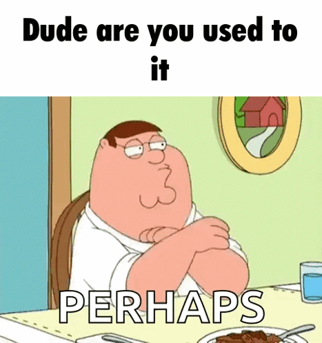 Peter Griffin From Family Guy Is Sitting At A Table With His Arms Crossed And A Plate Of Food . GIF