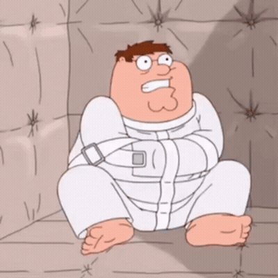 Peter Griffin From Family Guy Is Sitting In A Straitjacket GIF