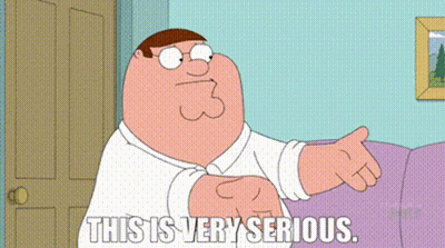 Peter Griffin From Family Guy Is Sitting On A Couch Pointing At Something . GIF