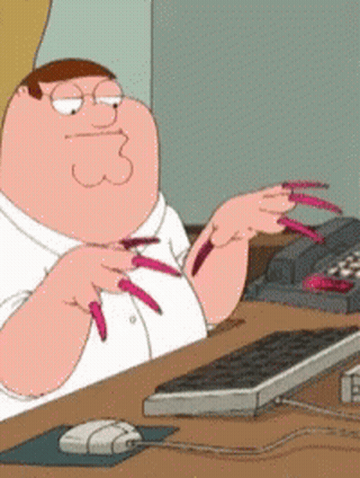 Peter Griffin Sitting At Desk With Keyboard And Mouse GIF