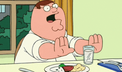 Peter Griffin Sitting At Table With Food GIF