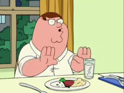 Peter Griffin Sitting At Table With Plate Of Food GIF