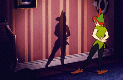 Peter Pan Standing In Front Of Wall With Shadow GIF