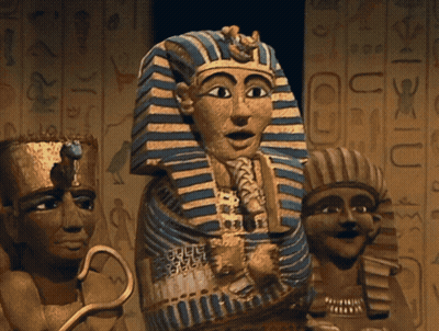 Pharaoh Statue With Blue And Gold Striped Robe GIF