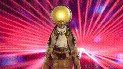 Pharaoh Statue With Owl And Sun On Head GIF