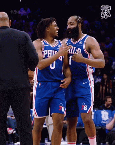 Philadelphia 76Ers Basketball Players Hugging GIF
