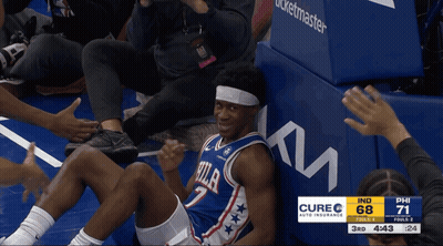 Philadelphia 76Ers Player Sitting On Bench GIF