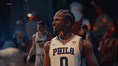 Philadelphia Basketball Player In Front Of Santa GIF