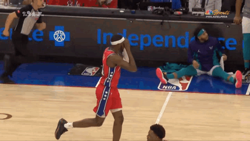 Philadelphia Basketball Player Kneeling
