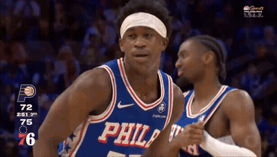 Philadelphia Basketball Player Standing in Front of Another