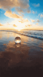 Philandmore Crystal Ball At The Ocean GIF