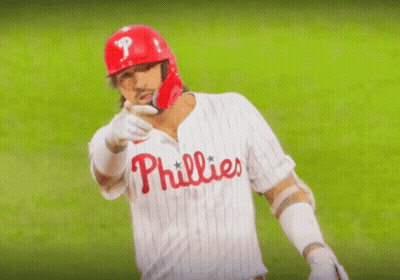 Phillies Baseball Player In Red Helmet And White Jersey GIF