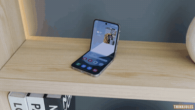 Phone On Wooden Shelf Saying Thinkjules GIF
