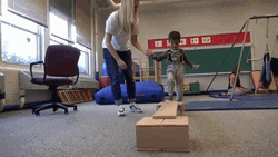 Physical Therapist With A Young Patient GIF