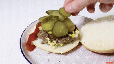 Pickles Added To Hamburger Saying Onion Slices GIF