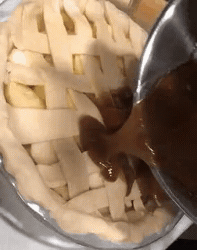Pie Crust Poured With Sauce GIF
