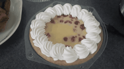 Pie With Whipped Cream In Plastic Container GIF
