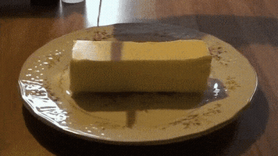 Piece Of Butter On A Plate GIF