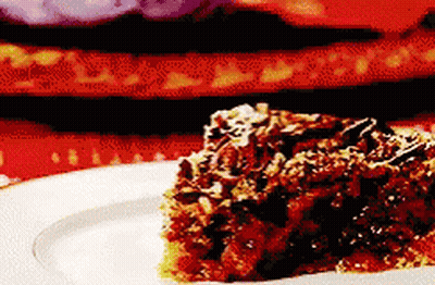 Piece Of Cake On White Plate With Red Background GIF