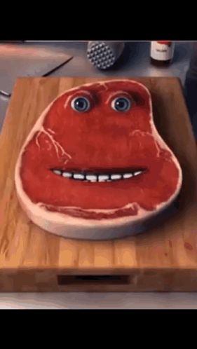 Piece Of Meat With Face Drawn On GIF