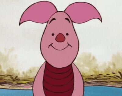 Piglet From Winnie The Pooh Stands In Front Of A Body Of Water GIF