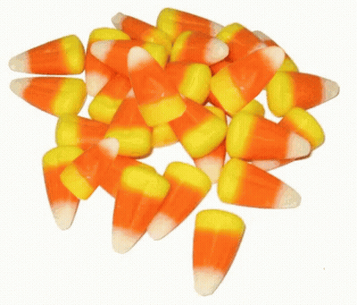 Pile Of Candy Corn With Drawn Faces GIF