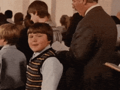 Pile Of Gummy Bears With Toothbrush GIF