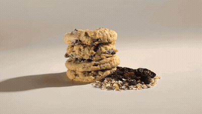 Pile Of Oats On Brown Background GIF