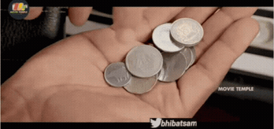 Pile Of Pennies Falling Into Pool Of Water GIF