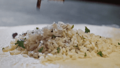 Pile Of Rice Being Poured GIF