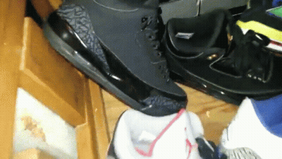 Pile Of Shoes On Table GIF