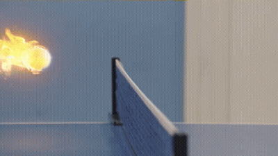 Ping Pong Ball With Flames Hitting Net