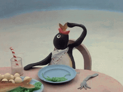 Pingu Eating Fish GIF