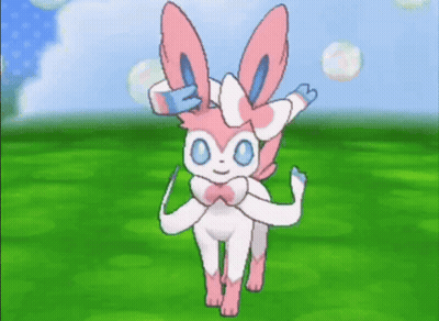 Pink And White Bunny With Blue Eyes Standing In Field GIF