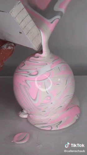 Pink And White Marbled Vase With TikTok Watermark GIF