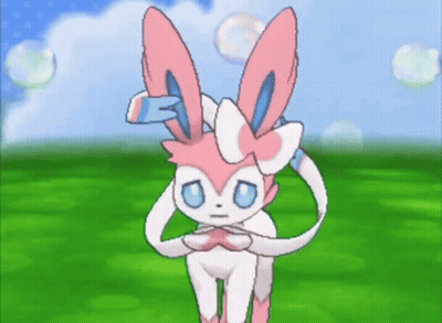Pink And White Rabbit With Blue Eyes Standing In Field GIF