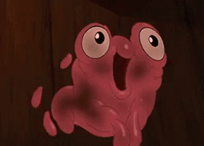 Pink Cartoon Character With Big Eyes And Mouth Open GIF
