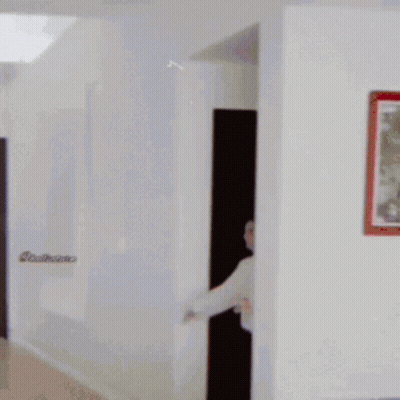 Pink Chair With White Pillow In Living Room GIF