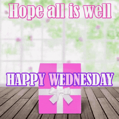 Pink Gift Box On Wooden Floor Saying Hope All Is Well Happy Wednesday GIF
