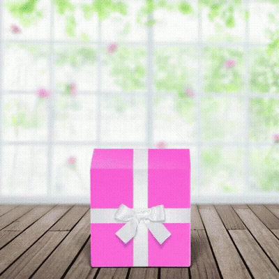 Pink Gift Box With White Bow On Wooden Floor GIF