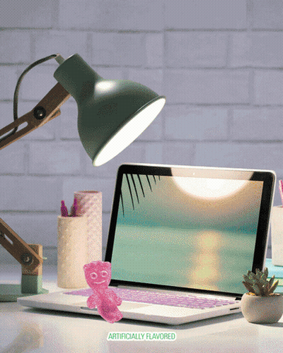 Pink Gummy Bear On Laptop GIF