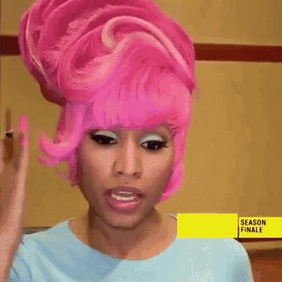 Pink Hair Woman In Blue Shirt With Season Finale Sign GIF