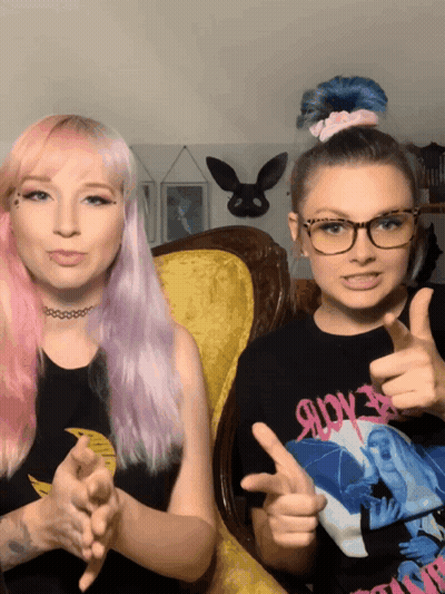 Pink-Haired Girl Thumbs Up Next To Glasses Girl GIF