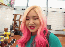 Pink Haired Girl Using Magnifying Glass GIF