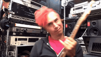 Pink-Haired Man Playing Guitar By Akai Rack GIF