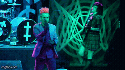 Pink-Haired Man Playing Guitar By Akai Rack GIF