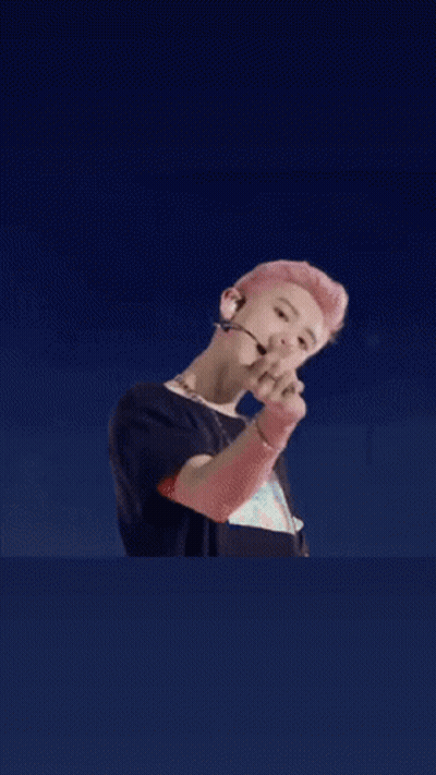 Pink-Haired Person With Microphone And Headphones GIF