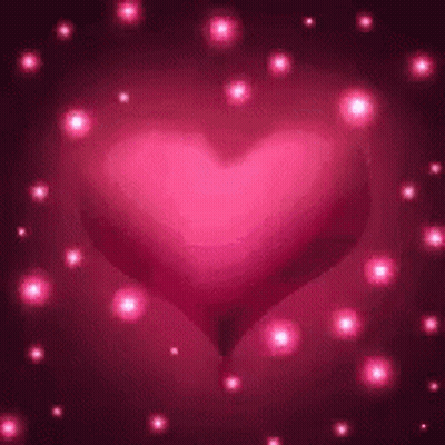 Pink Heart Surrounded By Pink Lights GIF